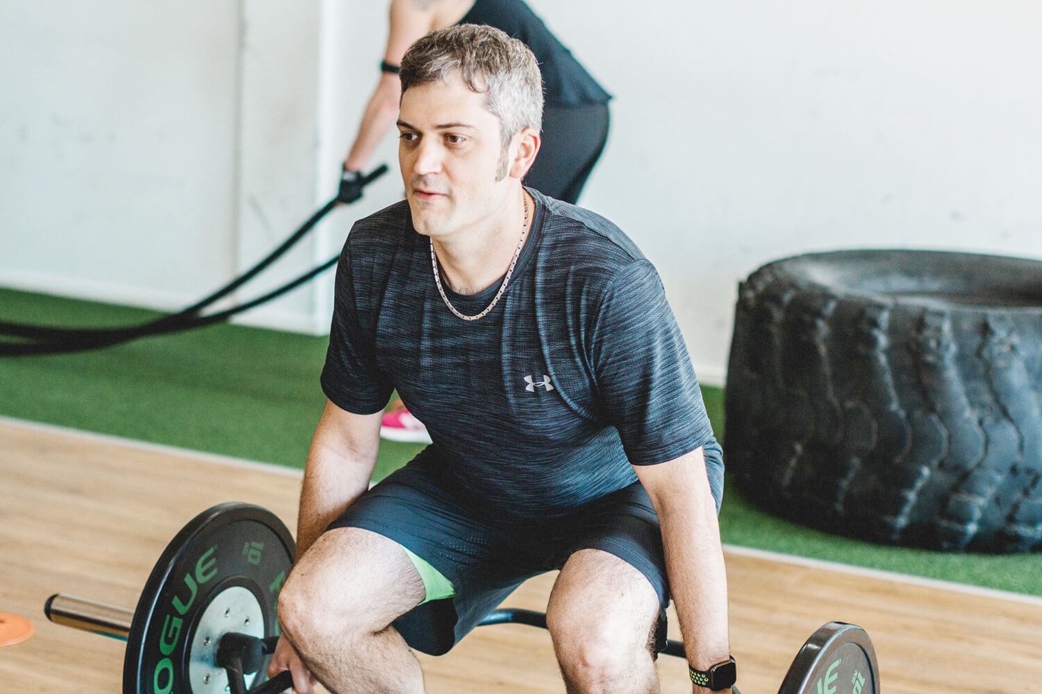 Hardest 30 high intensiv training participant benj with barbells